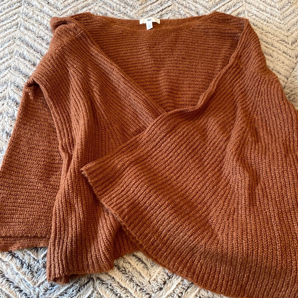 Loose fitting sweater with bell sleeves